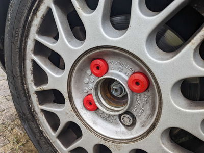 Red wheel nut covers