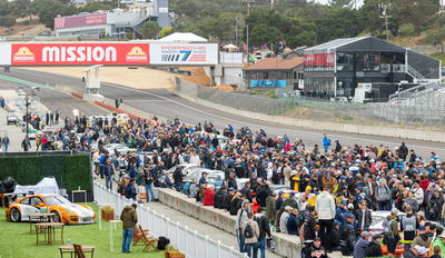 A busy pit lane at Laguna Seca during last year's Porsche Rennsport Reunion