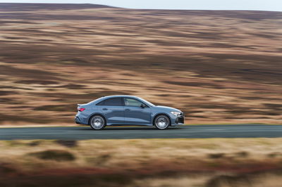 Audi RS3 - side, driving