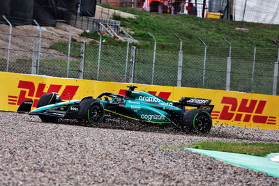 An Aston Martin F1 car sliding into the gravel during the 2023 Spanish Grand Prix (XPB Images)