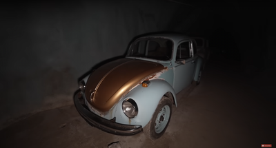 Abandoned VW Beetle in a mine