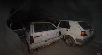 Abandoned VW Polo and Golf in a mine